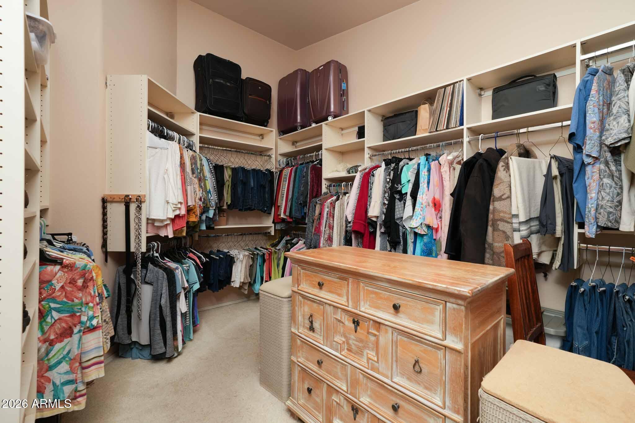 1005 South Page Springs Road Cornville, AZ 86325 - Photo 32 of 43 a view of walk in closet with clothes and shoes