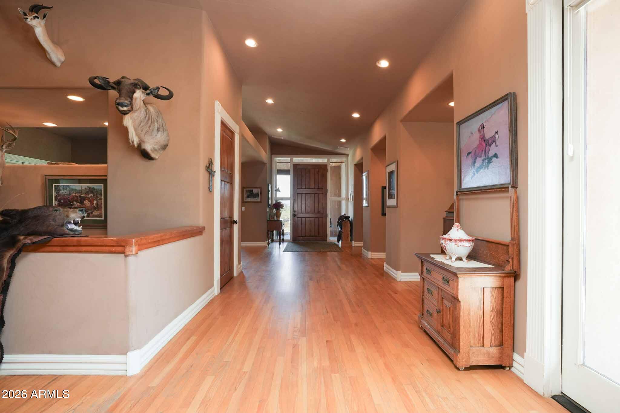 1005 South Page Springs Road Cornville, AZ 86325 - Photo 39 of 43 a view of a hallway with wooden floor