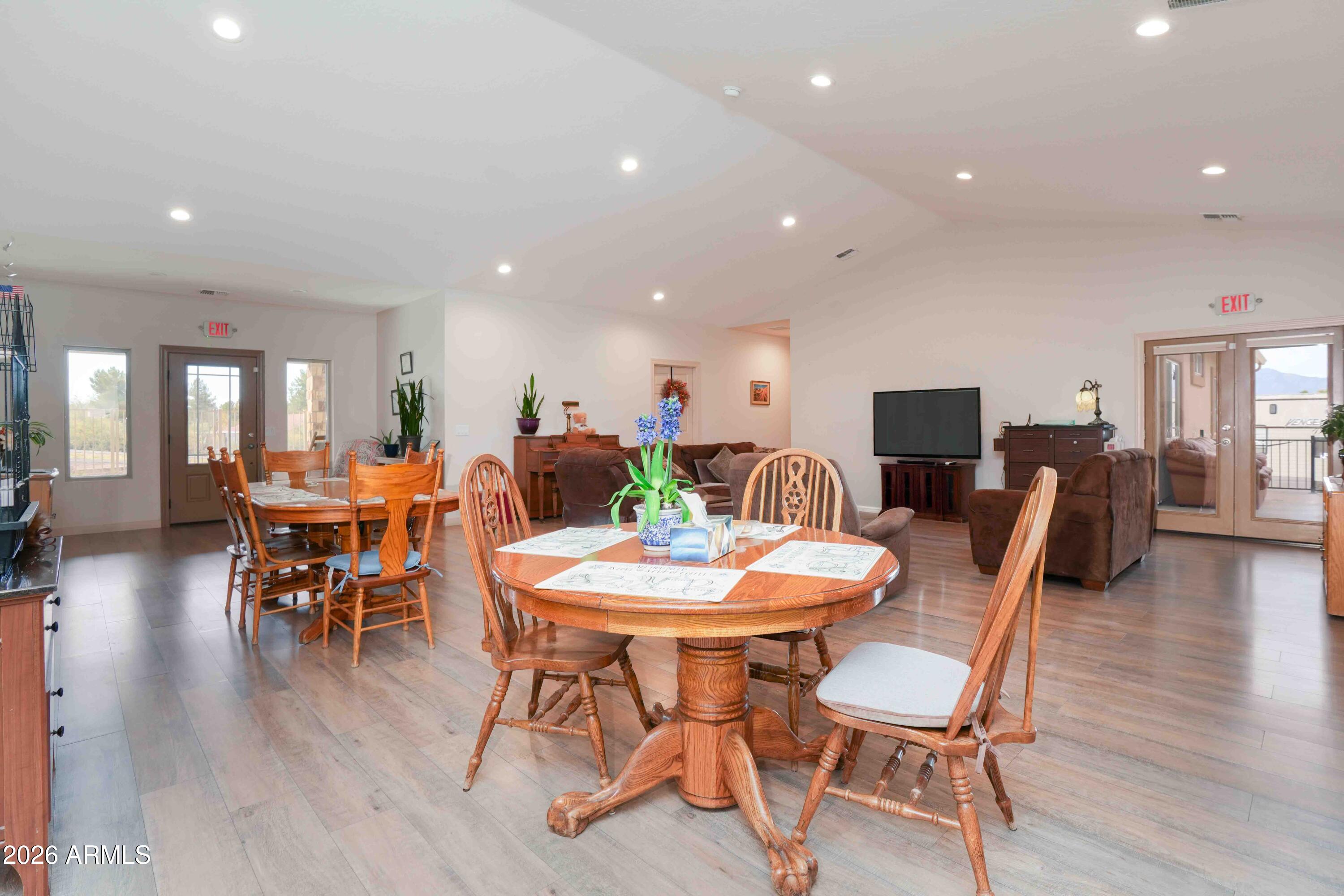 1005 South Page Springs Road Cornville, AZ 86325 - Photo 8 of 43 a view of a dining room with furniture and wooden floor