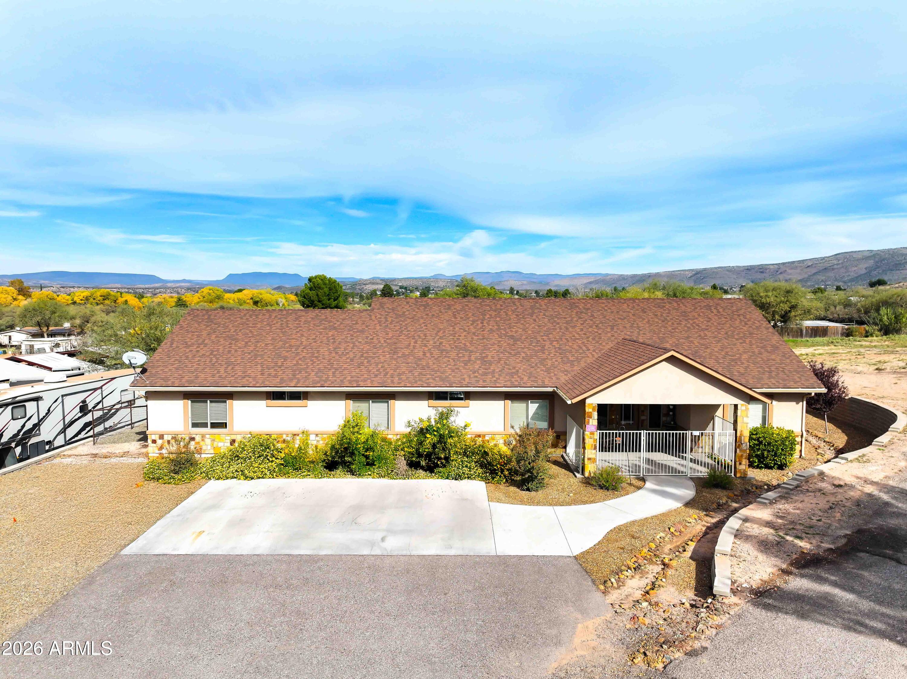 1005 South Page Springs Road Cornville, AZ 86325 - Photo 10 of 43 a aerial view of a house with a yard