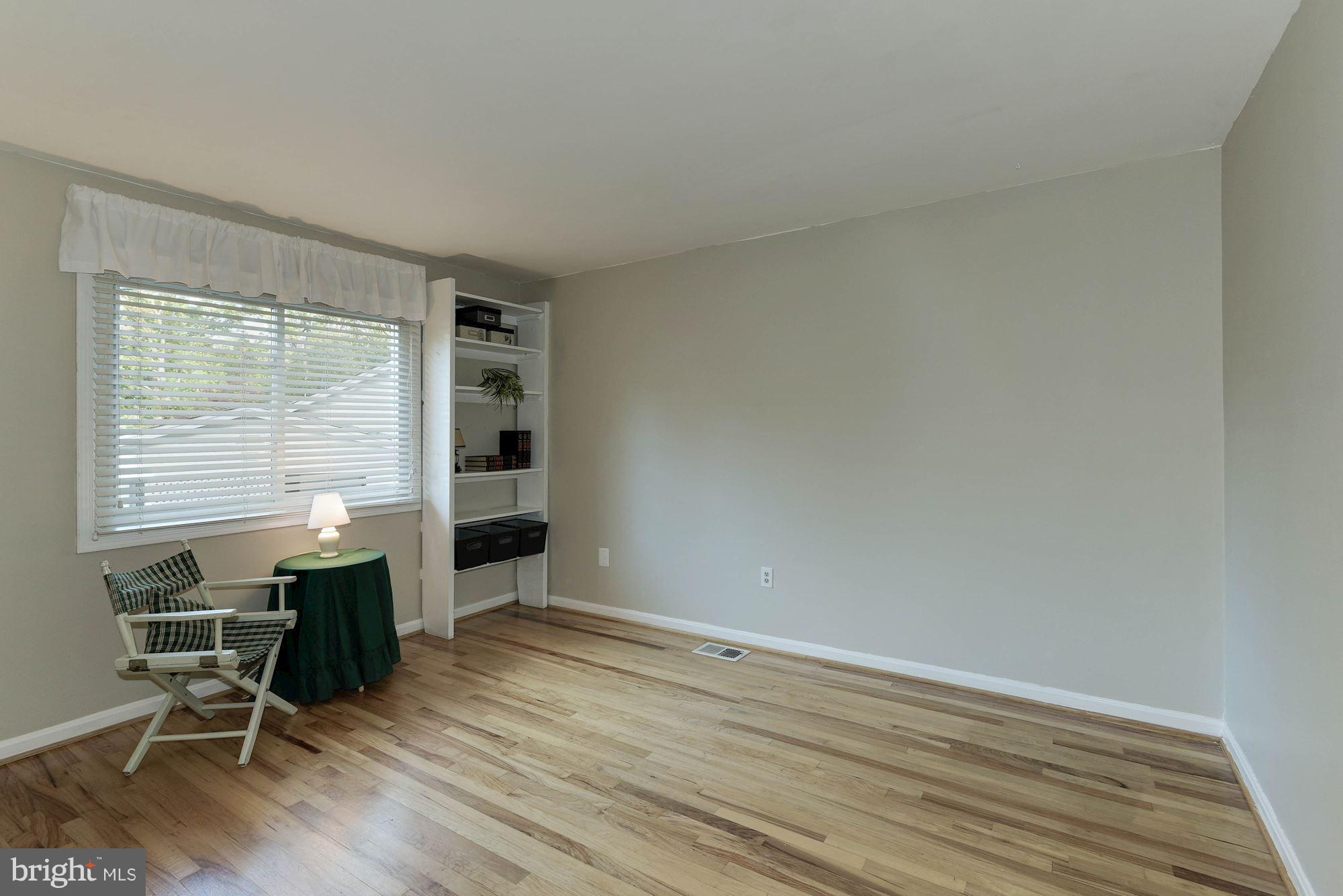 4723 Pickett Road Fairfax, VA 22032 - Photo 11 of 30 Second Bedroom: Spacious + Built-in Bookcases