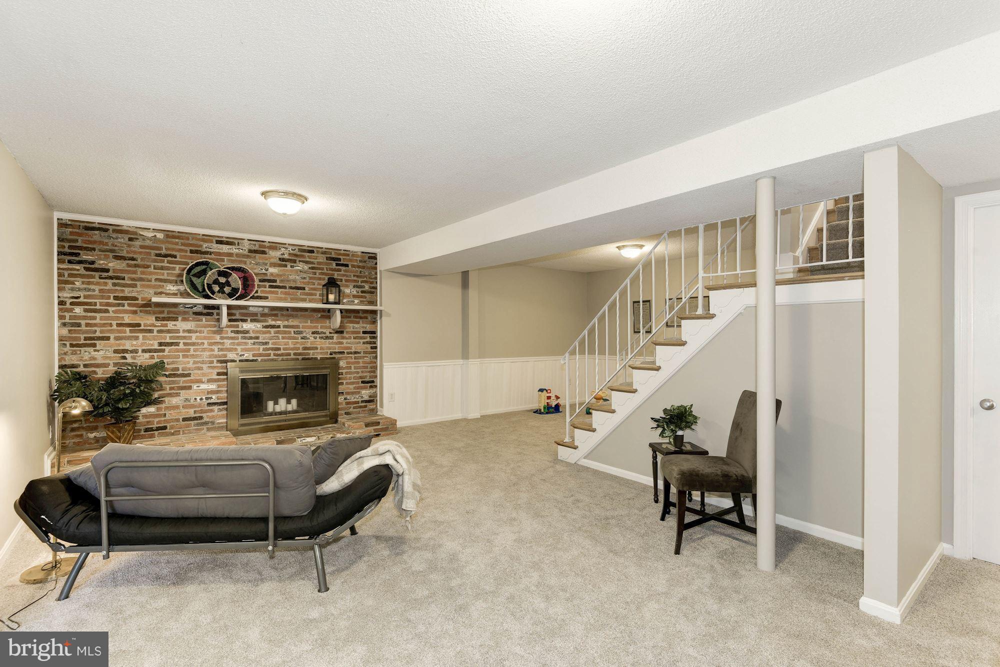 4723 Pickett Road Fairfax, VA 22032 - Photo 14 of 30 Rec Room with Woodburning Fireplace
