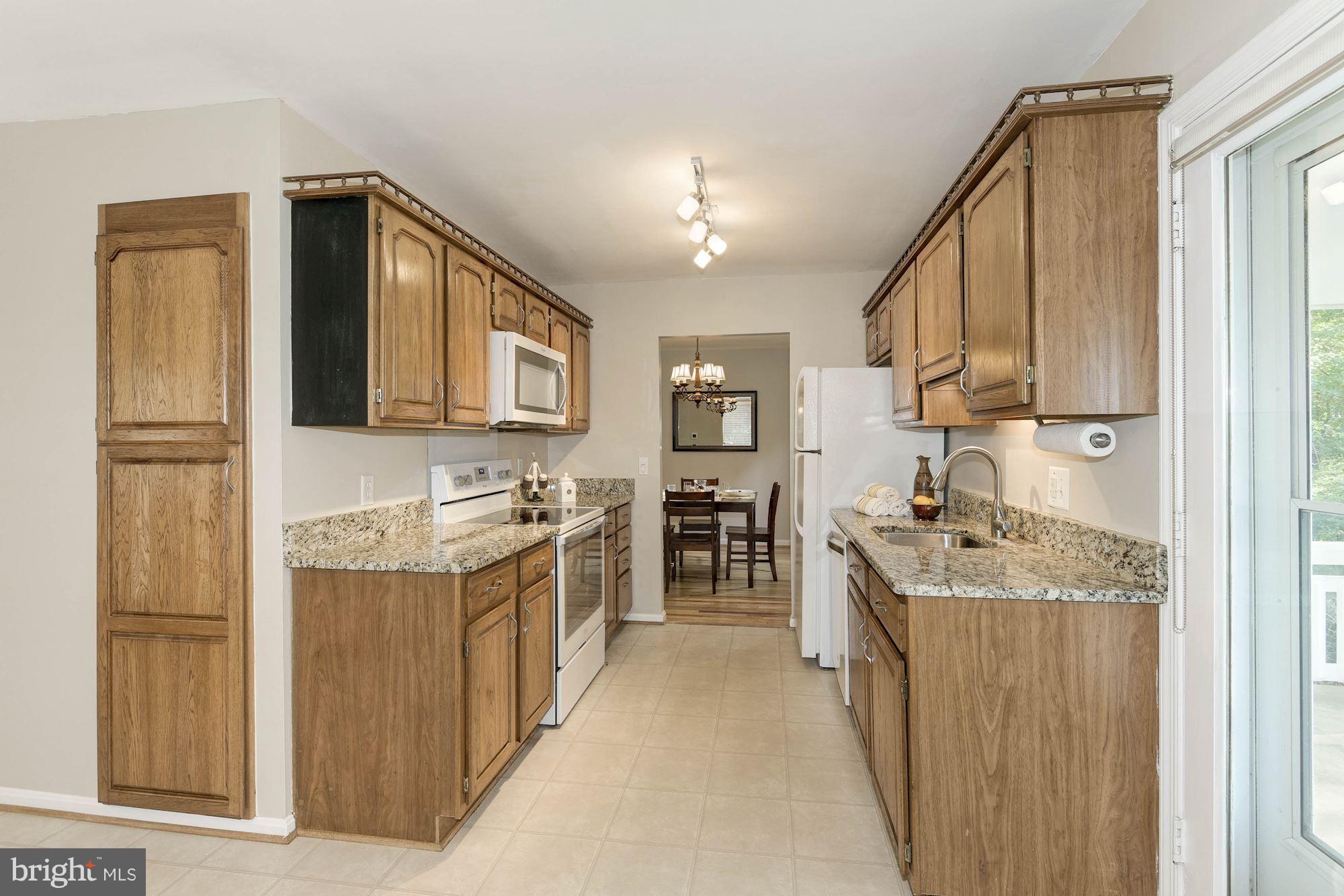 4723 Pickett Road Fairfax, VA 22032 - Photo 5 of 30 Updated Kitchen Offers Granite & New Lighting