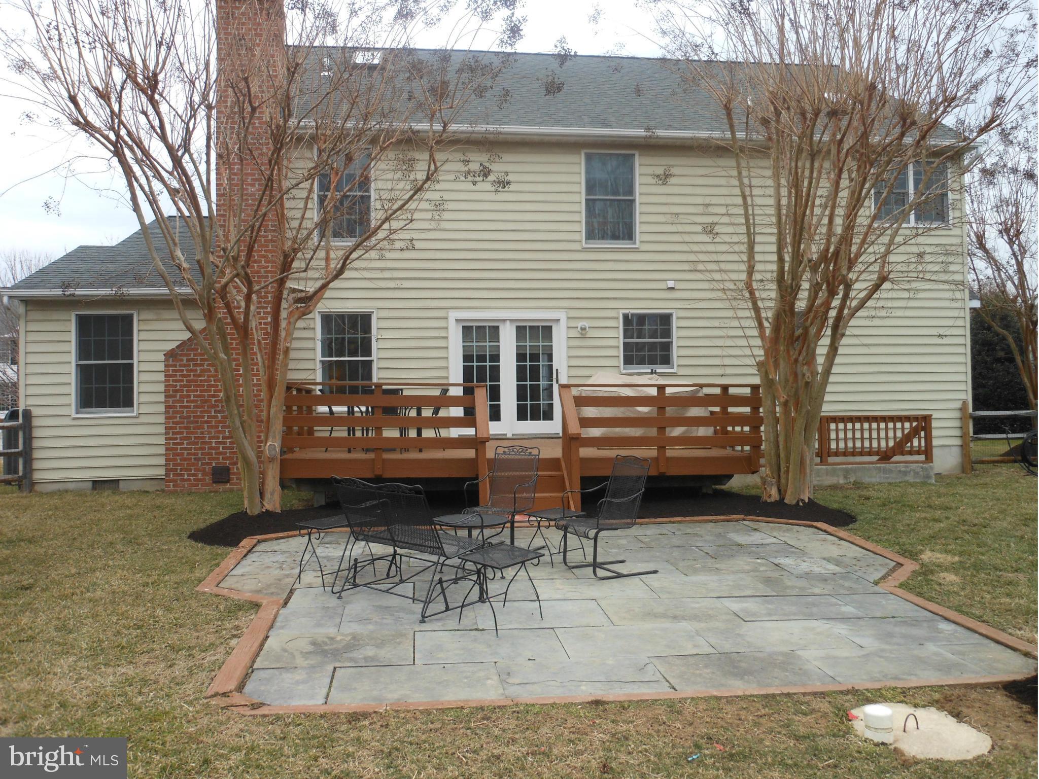 1474 Old Hickory Road Annapolis, MD 21409 - Photo 26 of 30 Back yard stone patio and deck