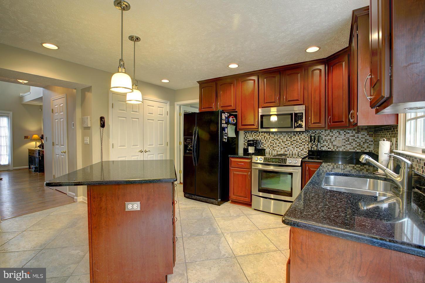 1474 Old Hickory Road Annapolis, MD 21409 - Photo 7 of 30 Kitchen with updated tops, cabinets