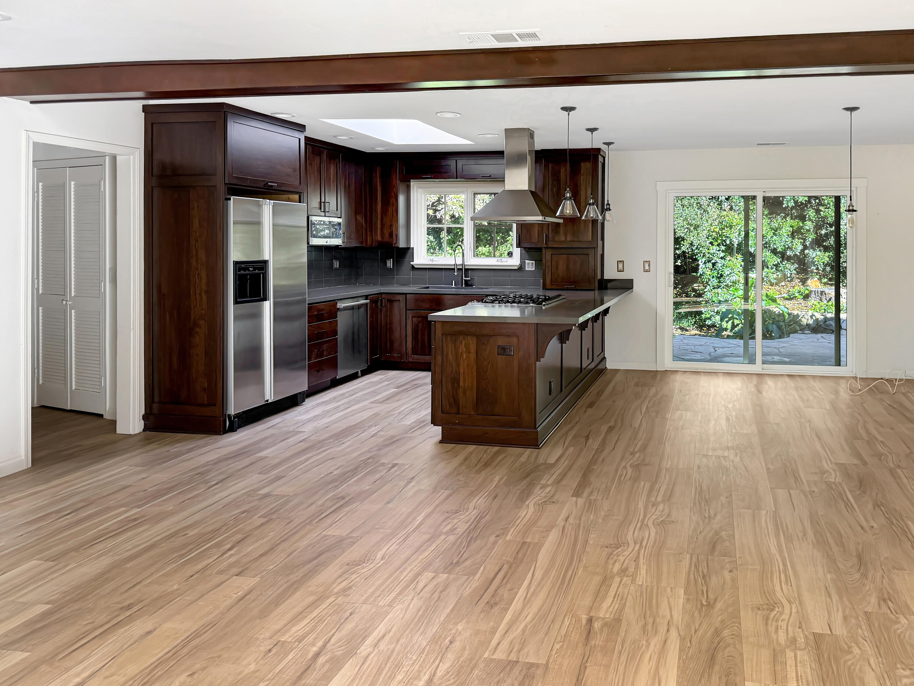 2020 Foothill Road Santa Barbara, CA 93105 - Photo 2 of 11 a kitchen with granite countertop a stove top oven a sink and cabinets