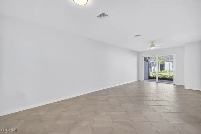 a view of an empty room with window