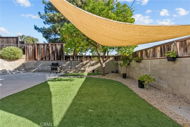a view of a back yard of the house