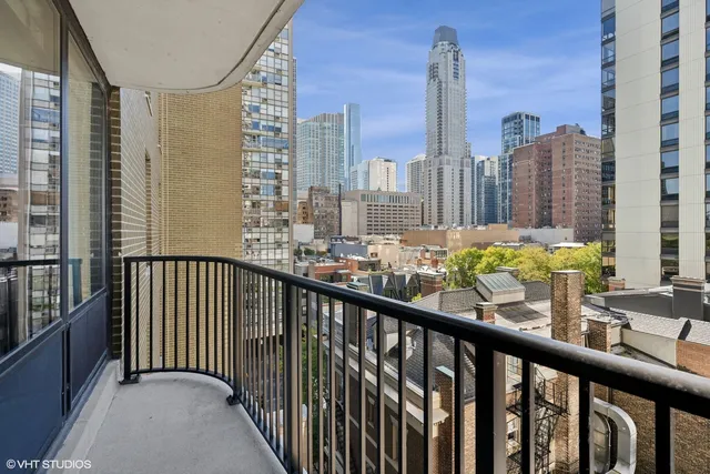 a view of a balcony with city view