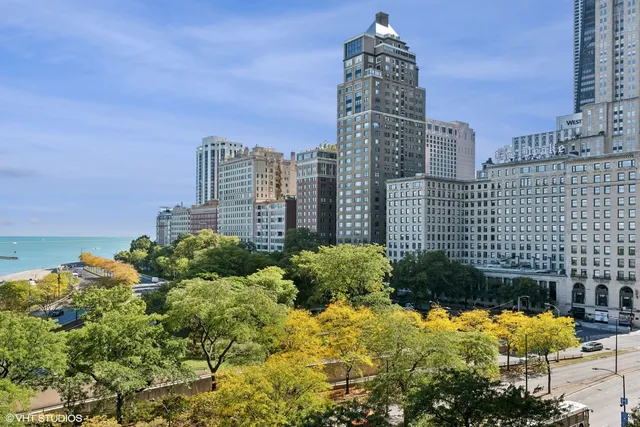 a view of a city with tall buildings