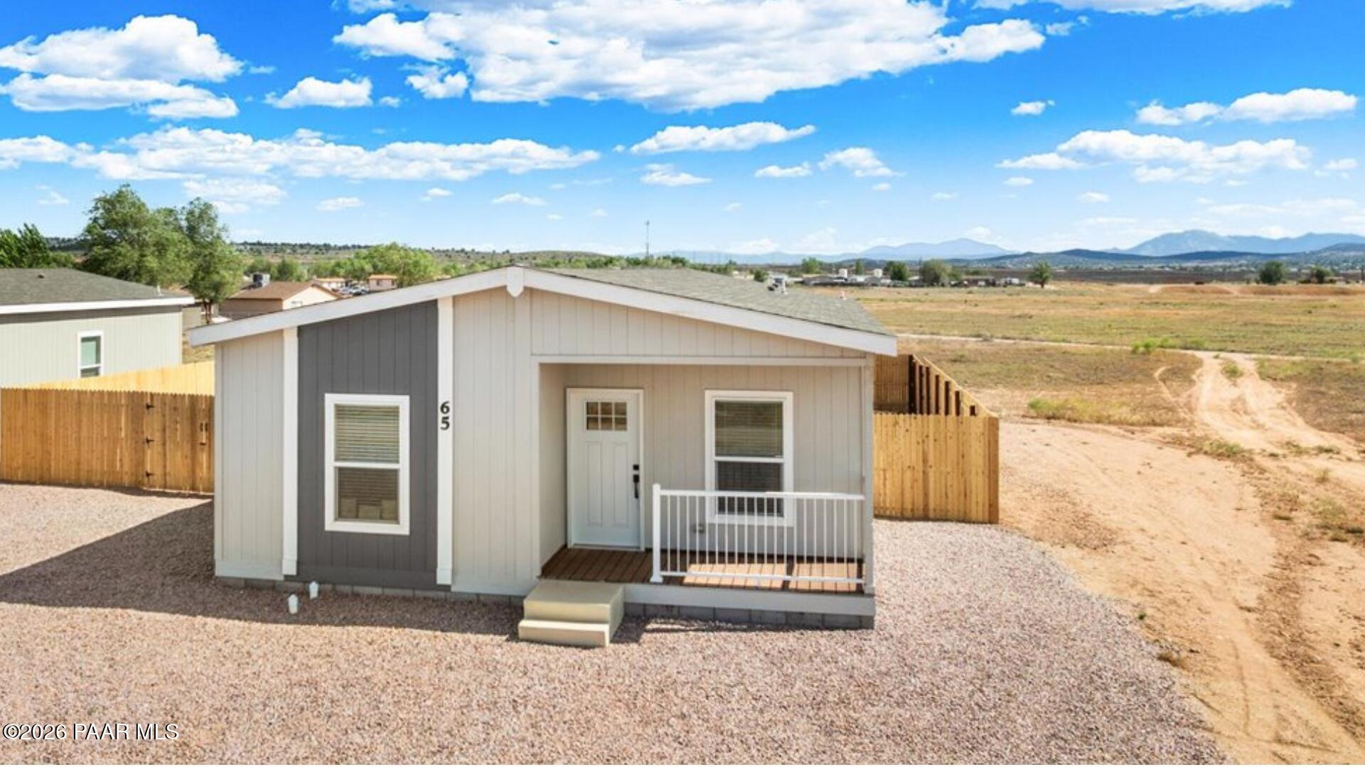 65 Hawaii Road Paulden, AZ 86334 - Photo 1 of 29 a view of a house with backyard and sitting area