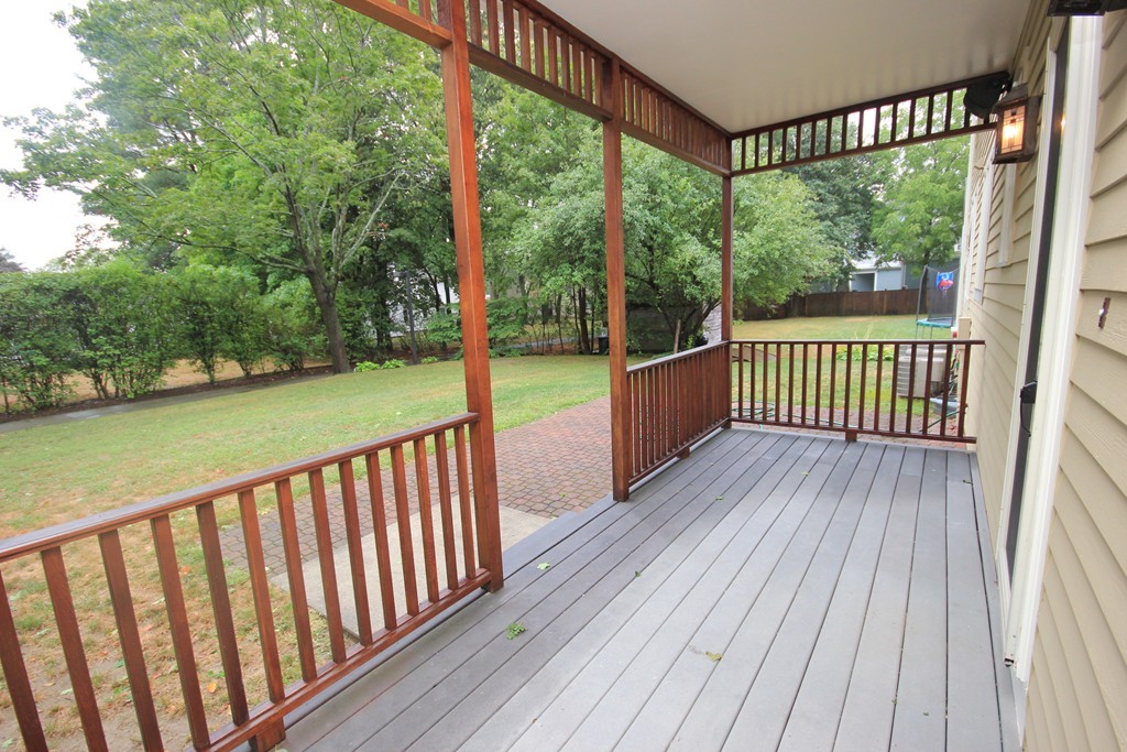 9 Orourke Path Newton, MA 02459 - Photo 29 of 30 a view of deck with wooden floor and fence