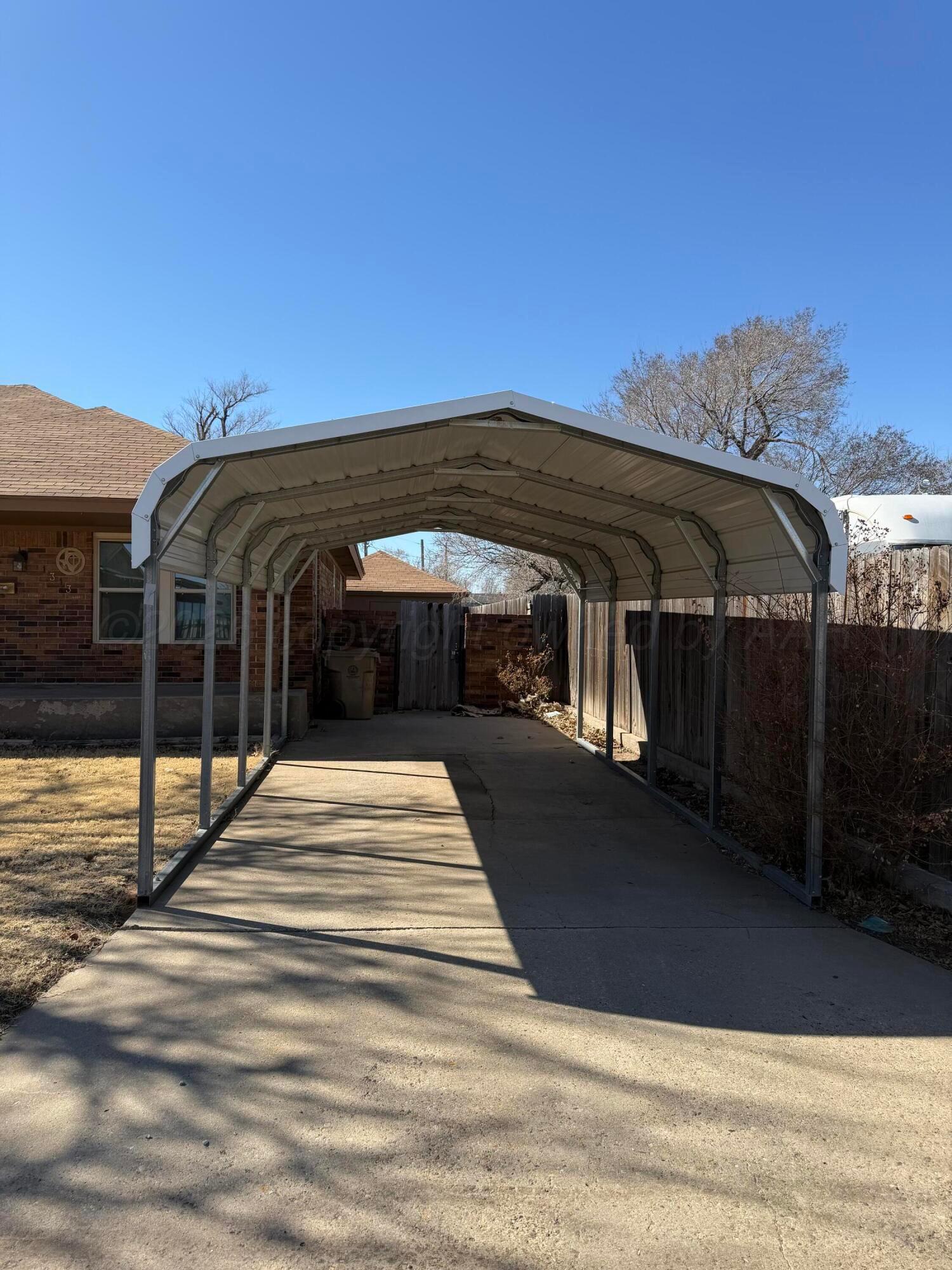 1313 Davis Street Borger, TX 79007 - Photo 2 of 15 a view of house with a yard