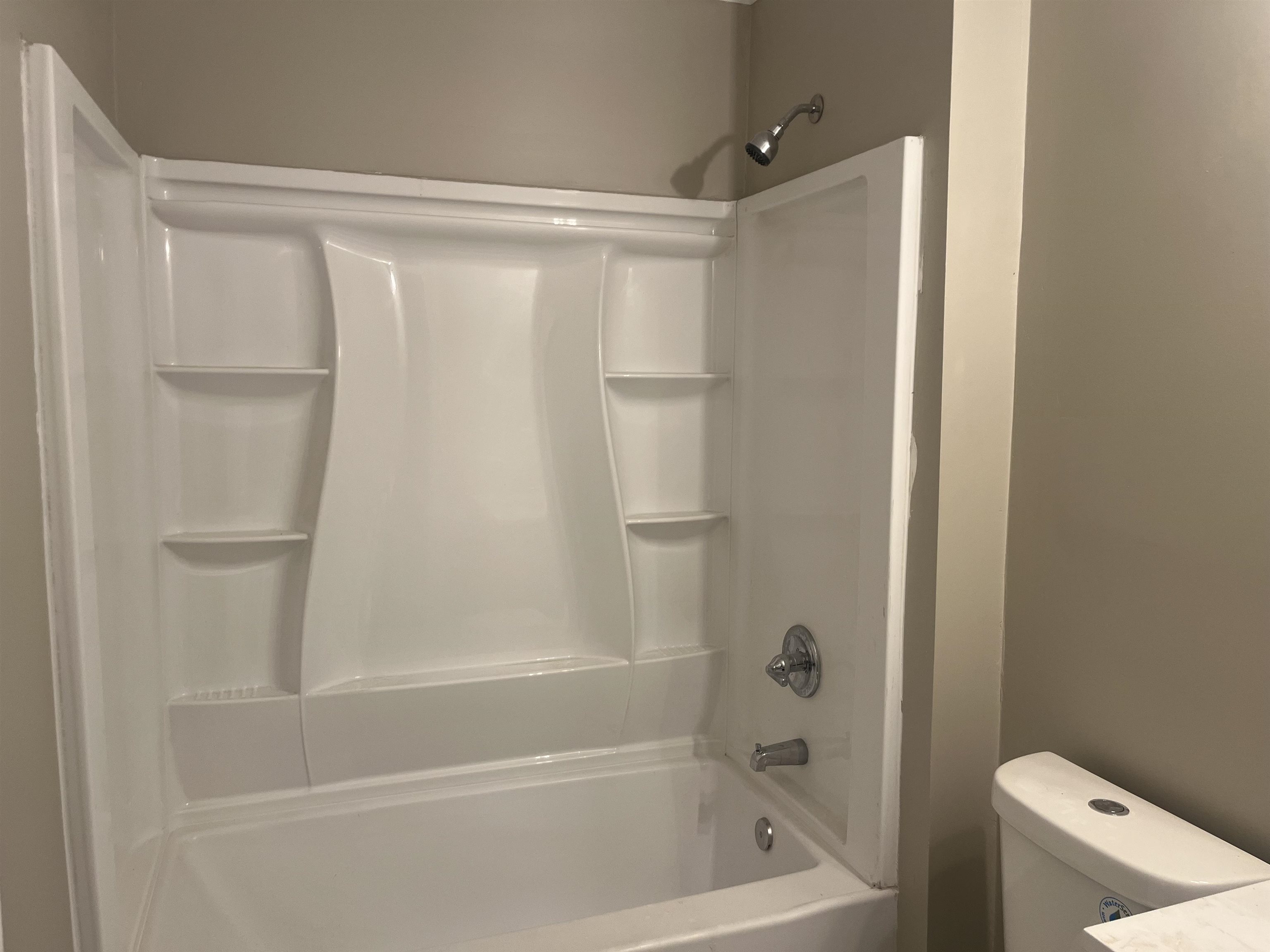 754 Hale Road Memphis, TN 38116 - Photo 8 of 9 a bathroom with a shower and a toilet