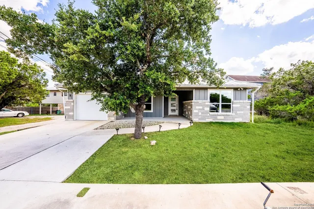 a black and white photo of a house
