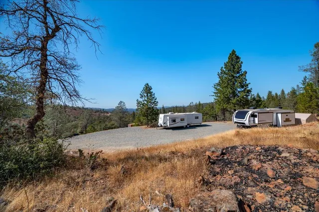 a house view with a backyard space