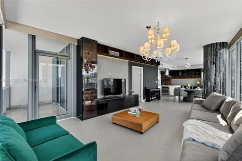 a kitchen with a sink stainless steel appliances and cabinets