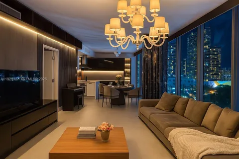 a bedroom with a bed and a view of bathroom