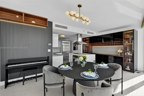 a bathroom with a sink a mirror and toilet