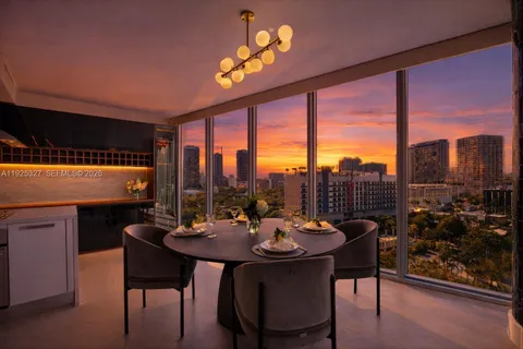 a view of a city with tall buildings