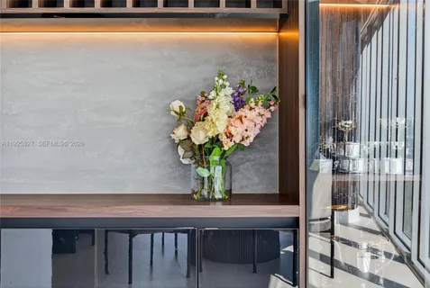 a view of swimming pool with outdoor seating