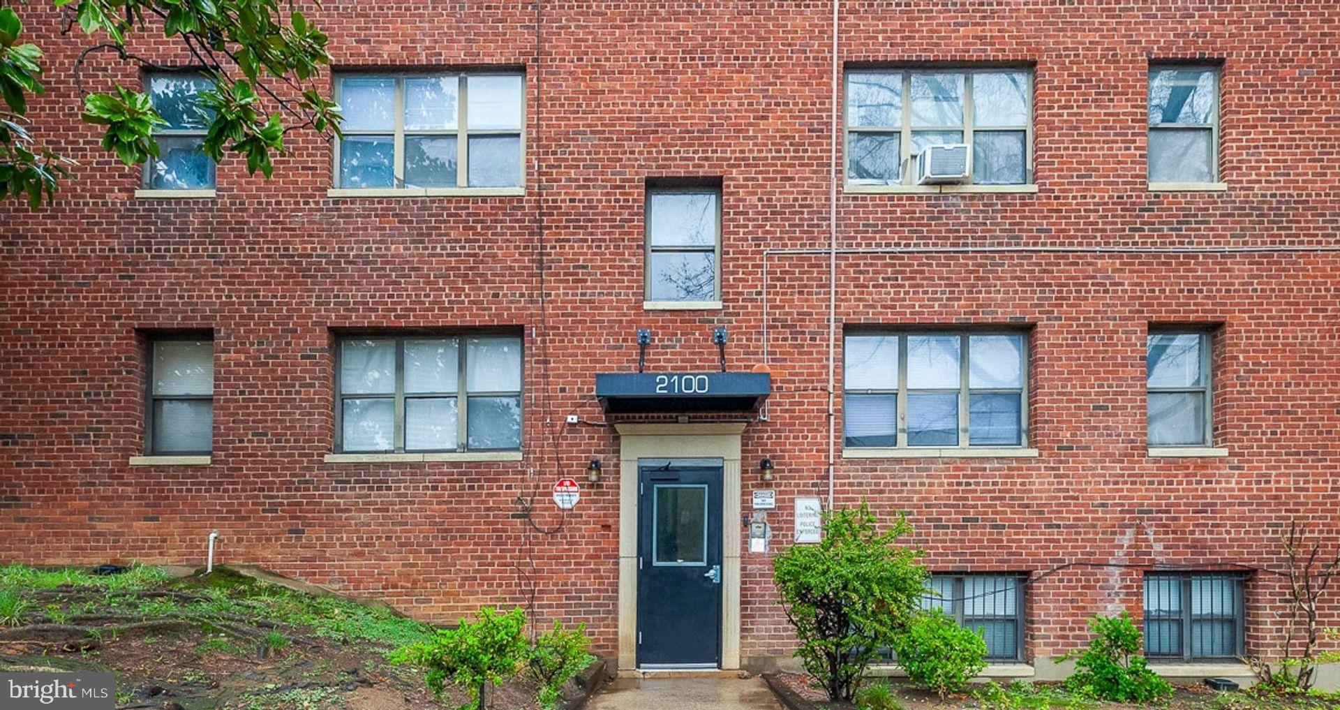 2100 Channing Street Northeast, Unit 1B Washington, DC 20018 - Photo 2 of 6 Charming brick facade with inviting entrance.