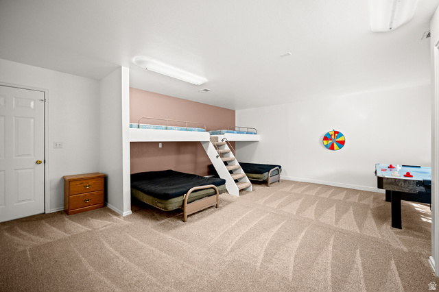 1825 West Mathis Park Place, Unit 46 St. George, UT 84770 - Photo 32 of 45 Bedroom featuring light colored carpet and baseboards