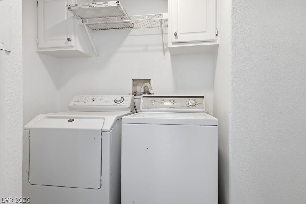 4550 Horn Road Pahrump, NV 89048 - Photo 8 of 20 A dedicated laundry room with functional appliances for daily chores.