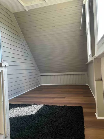 a view of a car park in front of house