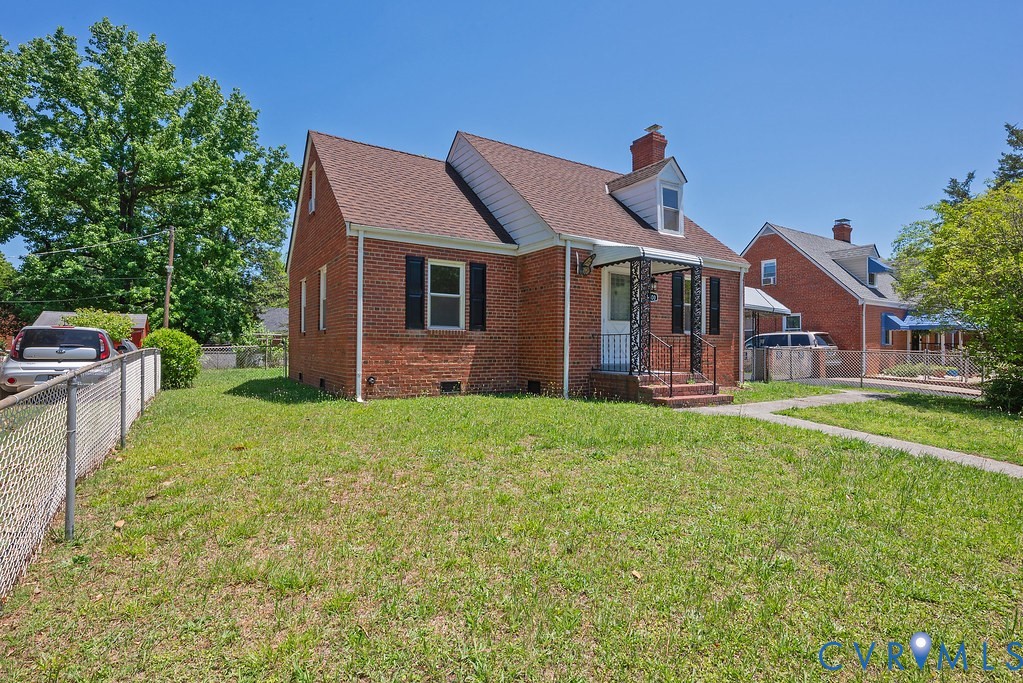 3400 Ryburn Road Richmond, VA 23234 - Photo 3 of 45 Brick exterior residence featuring a gabled roof,