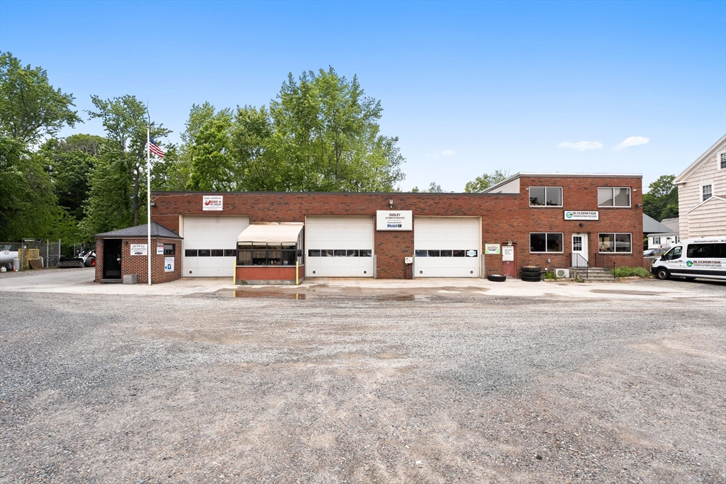 52-56 Dudley Street Arlington, MA 02476 - Photo 5 of 38 front view of a house with a street
