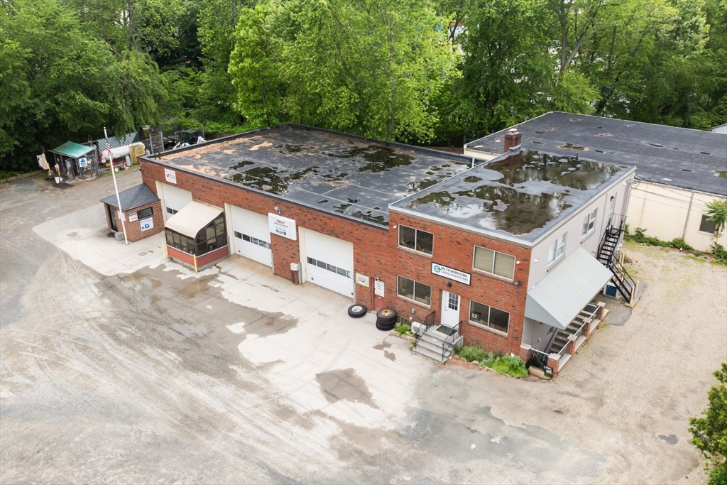 52-56 Dudley Street Arlington, MA 02476 - Photo 6 of 38 a view of a backyard with sitting area