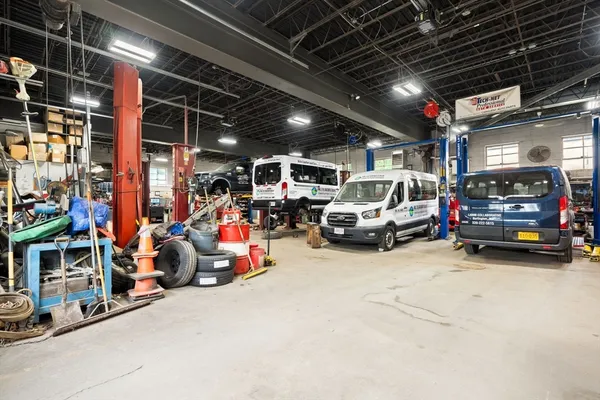 a view of parking garage with cars