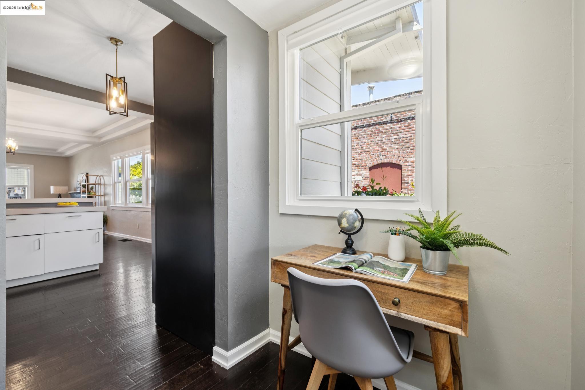 1092 Dwight Way Berkeley, CA 94710 - Photo 19 of 36 Office with dark wood finished floors and beam ceiling
