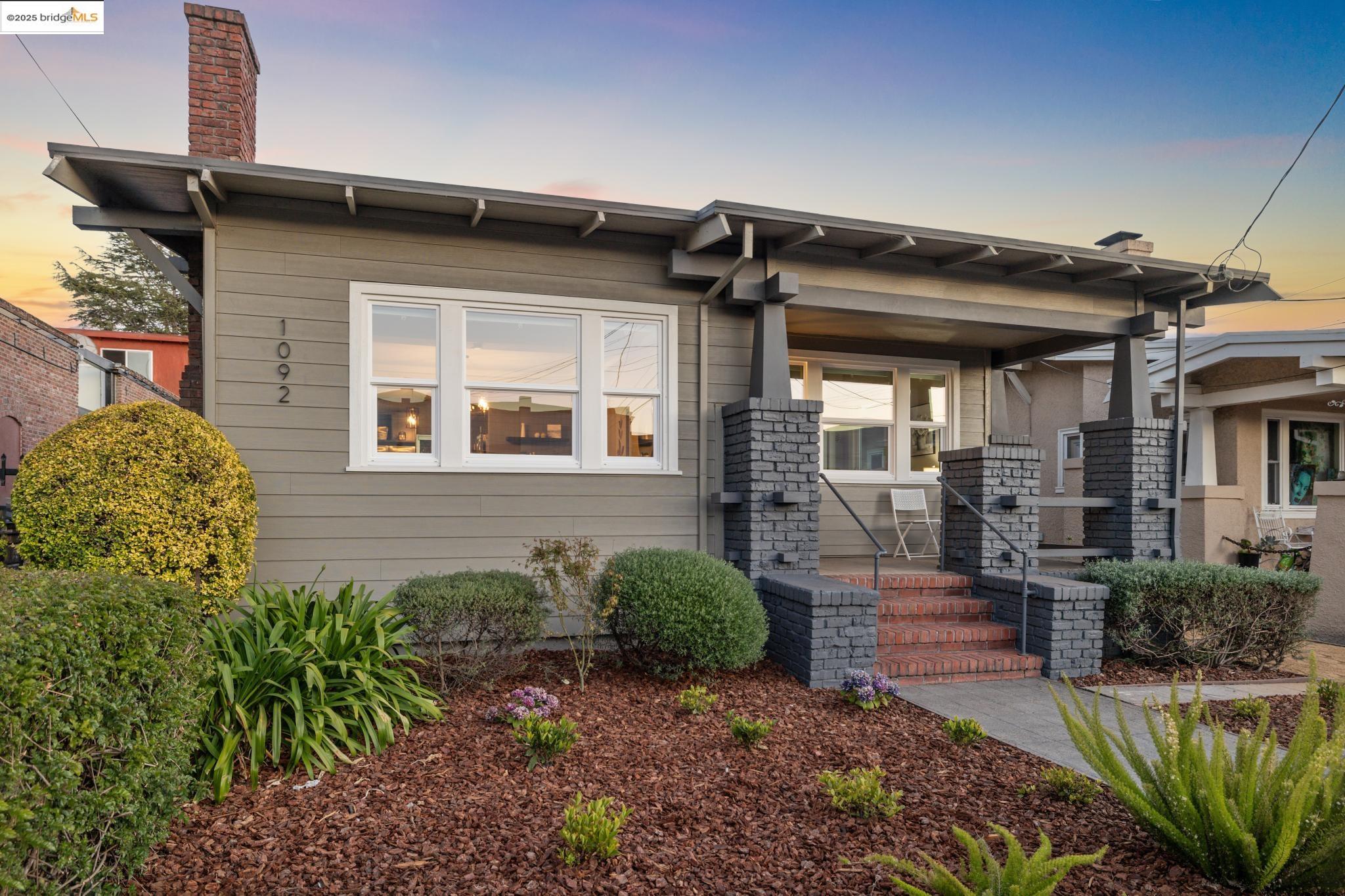 1092 Dwight Way Berkeley, CA 94710 - Photo 3 of 36 View of front of house with a chimney and covered porch