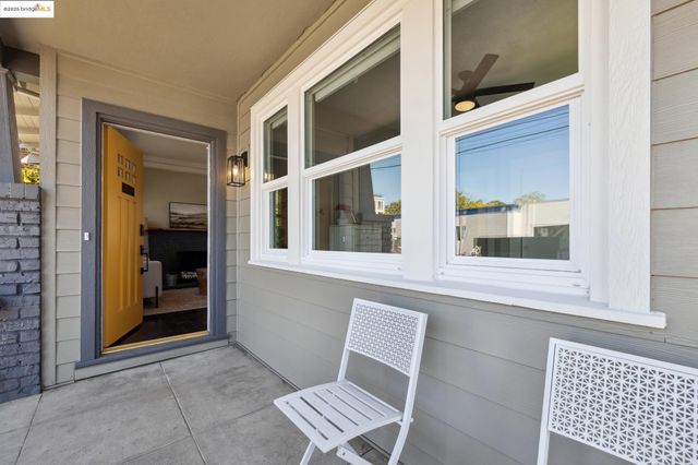 a view of chair and door in the house