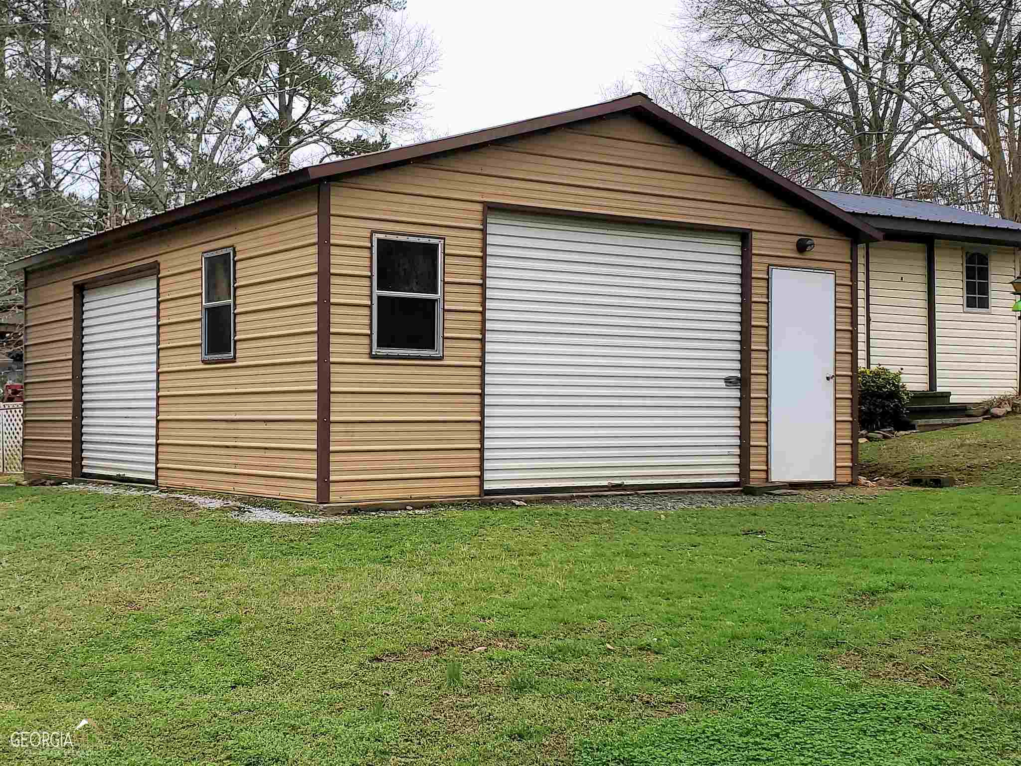 48 Leigh Street Commerce, GA 30529 - Photo 17 of 22 a view of a house with a yard