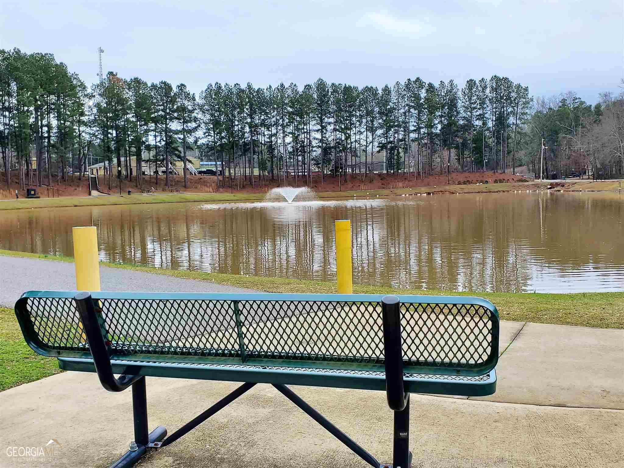 48 Leigh Street Commerce, GA 30529 - Photo 22 of 22 a view of a lake with a deck