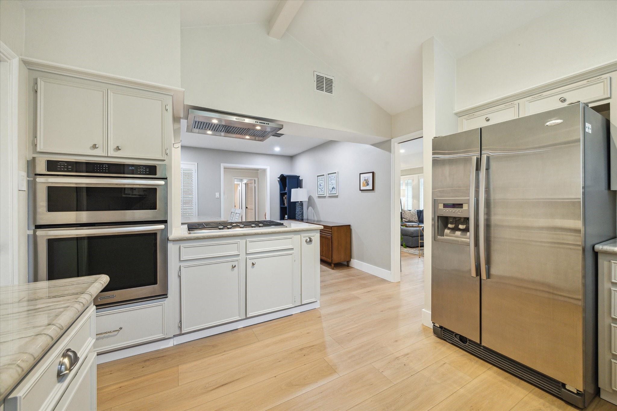 10002 Wickersham Lane Houston, TX 77042 - Photo 12 of 28 a kitchen with a refrigerator and a sink