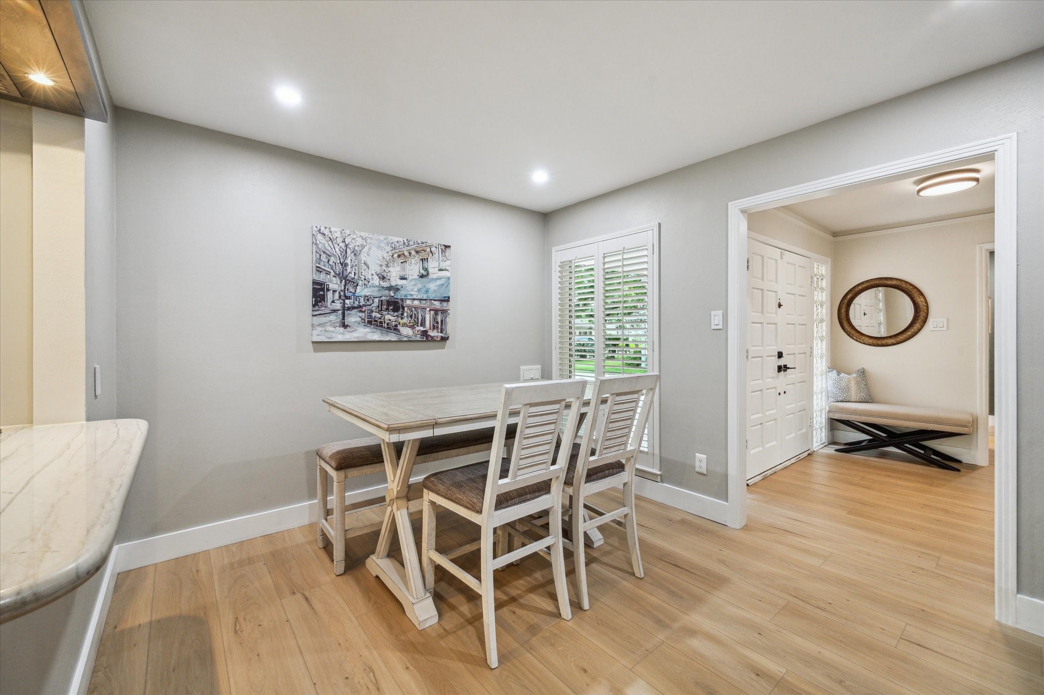 10002 Wickersham Lane Houston, TX 77042 - Photo 14 of 28 a view of a dining room with furniture and wooden floor
