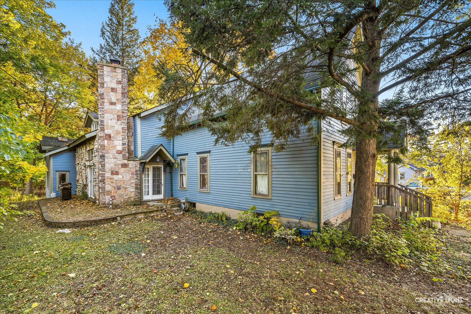 315 Congdon Avenue Elgin, IL 60120 - Photo 16 of 17 a front view of house with yard and trees around