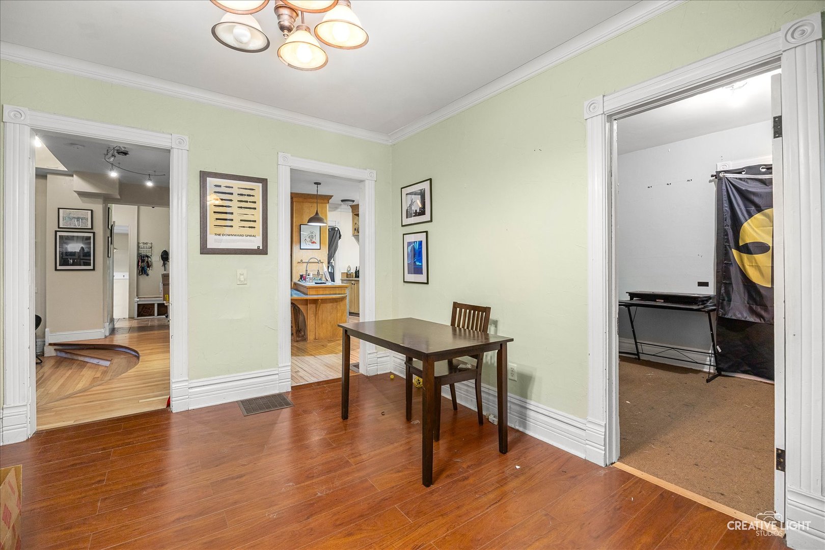 315 Congdon Avenue Elgin, IL 60120 - Photo 4 of 17 a view of a livingroom with furniture and a workspace