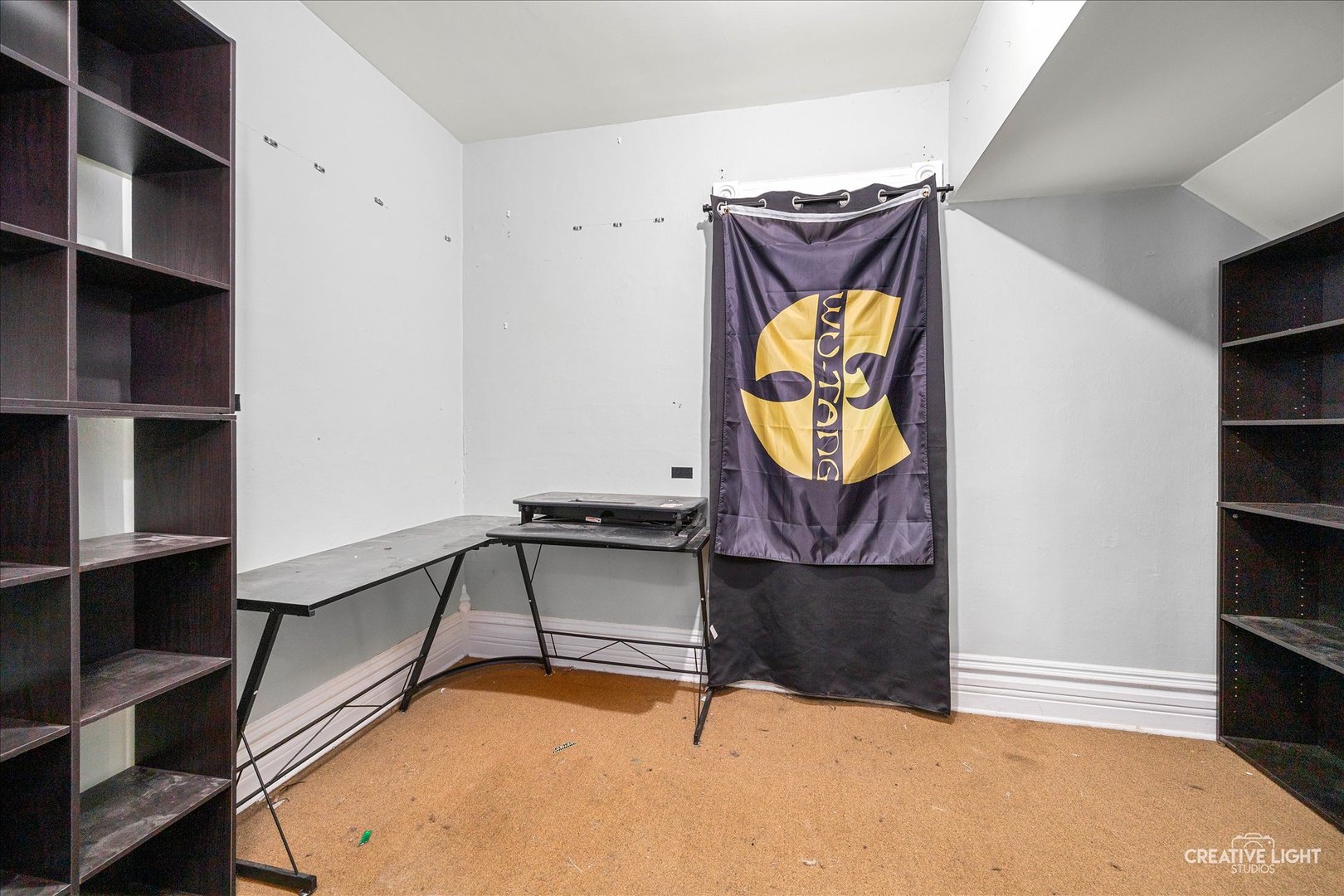 315 Congdon Avenue Elgin, IL 60120 - Photo 5 of 17 a view of walk in closet with clothes and shoes