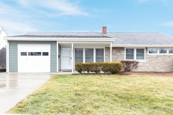 a view of a house with a big yard