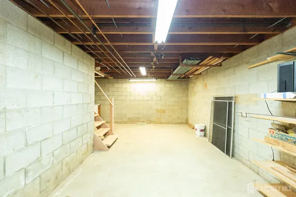 a view of a house with backyard and a small yard