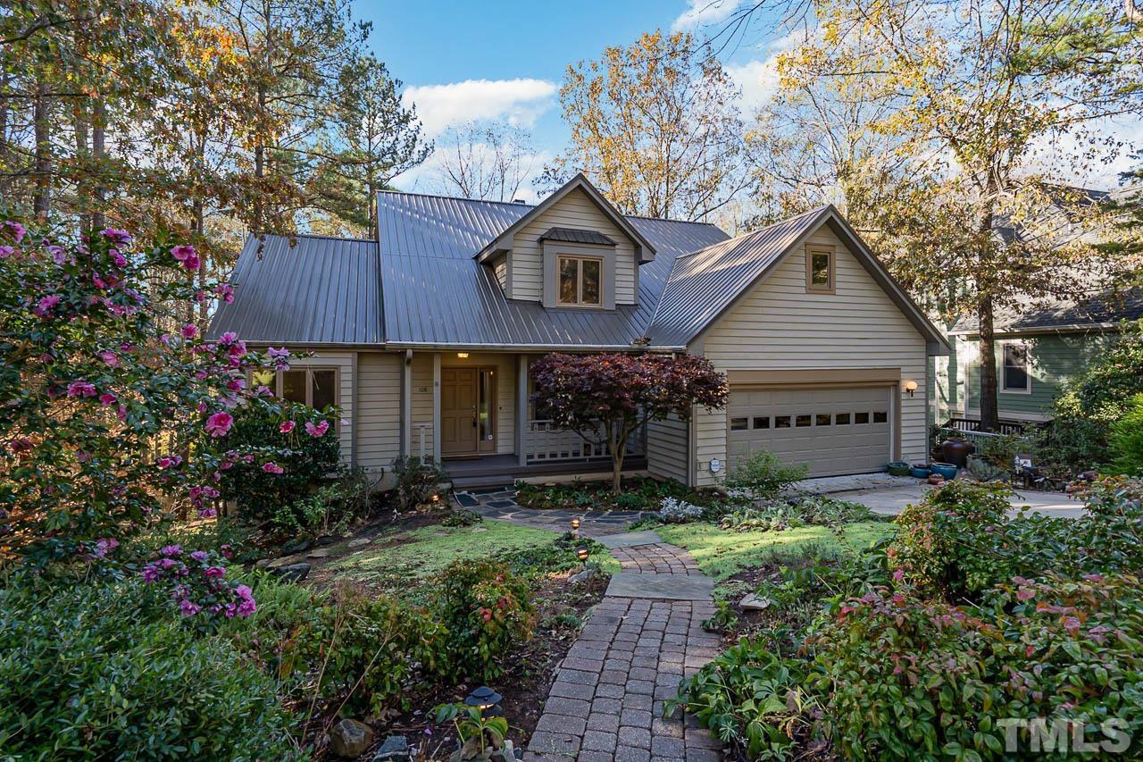 a house view with a garden space