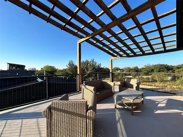 a view of a balcony with couch