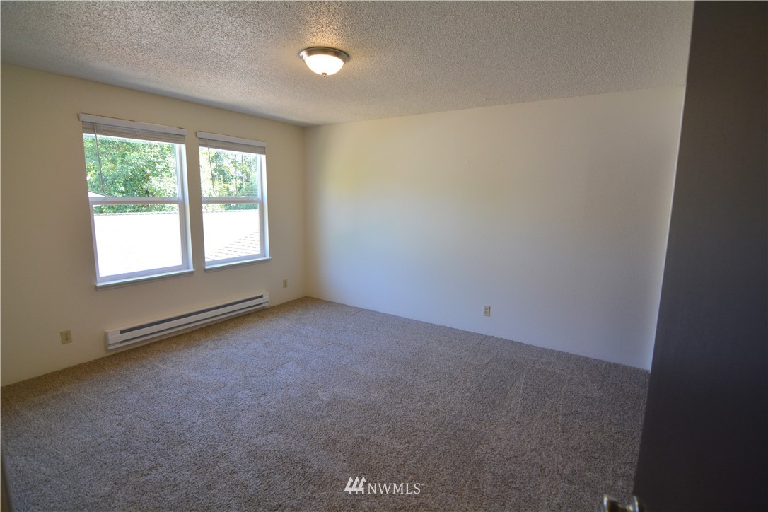 20515 Filbert Drive Bothell, WA 98012 - Photo 12 of 20 an empty room with a window