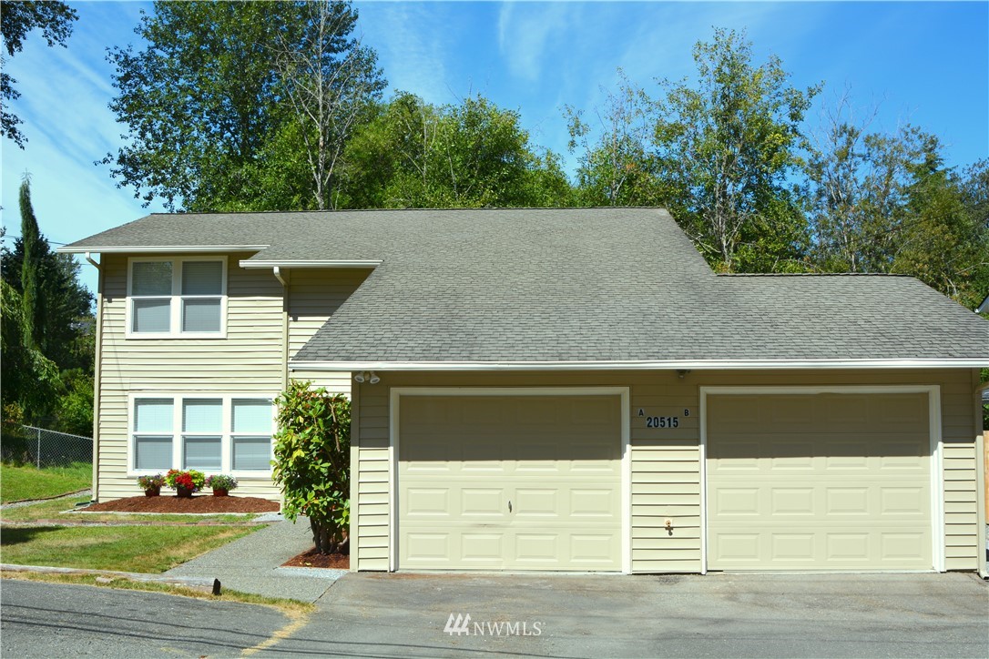 20515 Filbert Drive Bothell, WA 98012 - Photo 17 of 20 a view of front of house with a yard