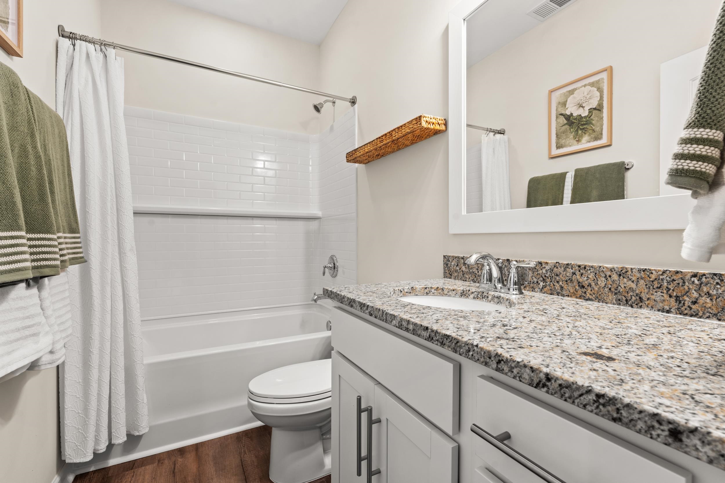 361 Palmetto Sand Loop Conway, SC 29527 - Photo 20 of 28 Bathroom with vanity, shower / tub combo, and dark wood-type flooring